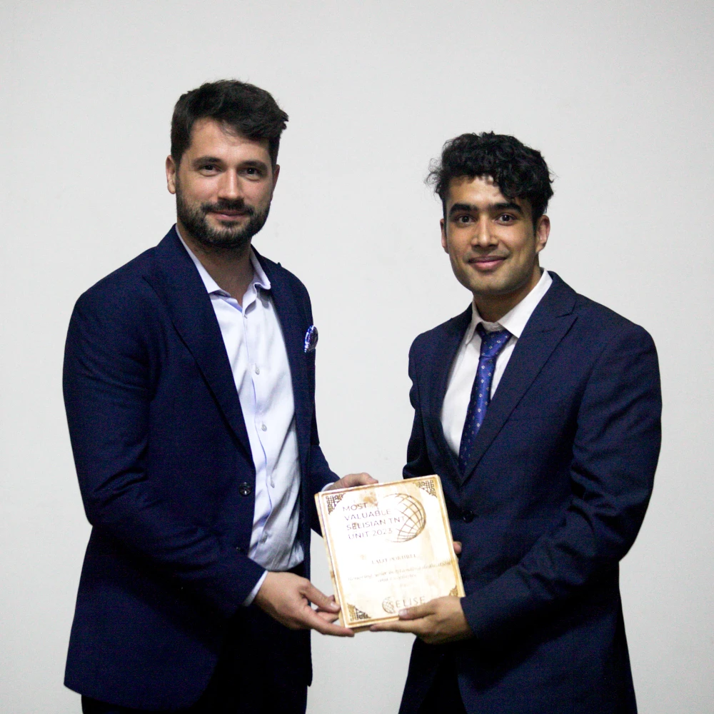 Lalit Pokhrel being awarded by the CEO of Selise Group.